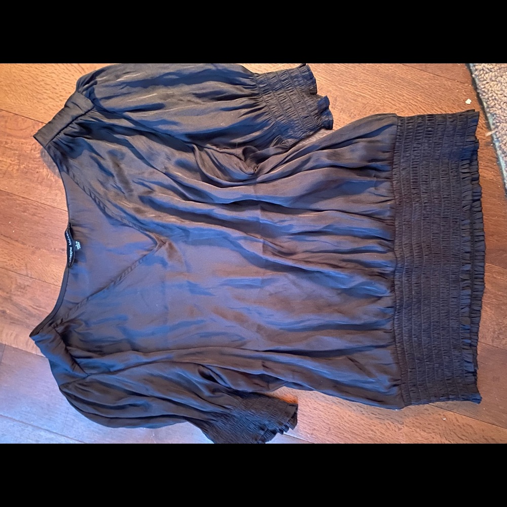 Black satin top.